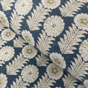 A folk-inspired block print style design with a stylised floral motif in indigo blue. A versatile mid scale design printed suitable for curtains and blinds.