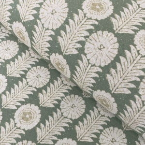 A folk-inspired block print style design with a stylised floral motif in green. A versatile mid scale design suitable for curtains and blinds.