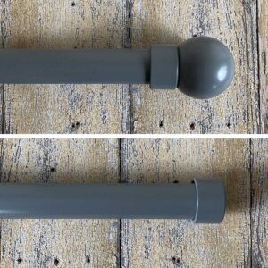 a dark grey curtain track for wide windows