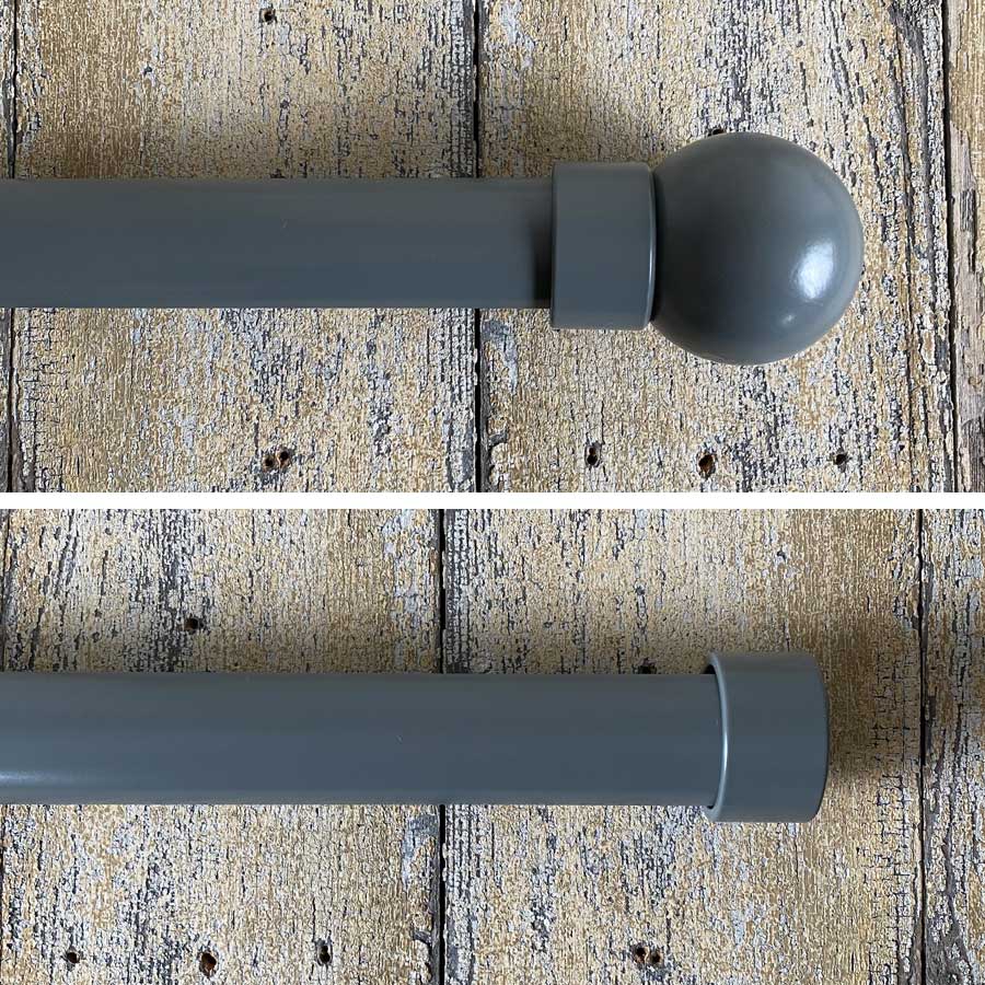 a dark grey curtain track for wide windows