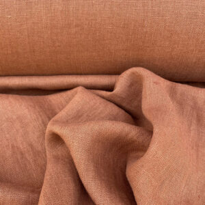 100% Linen fabric with a super soft drape in a soft terracotta. This mid weight linen is suitable for curtains and blinds where a good drape is uppermost.