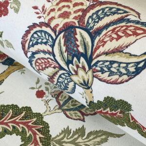 Large scale Tree of Life linen curtain fabric with stylised leaves and branches in greens and blues. Printed on 100% cotton, ideal for curtains and blinds.