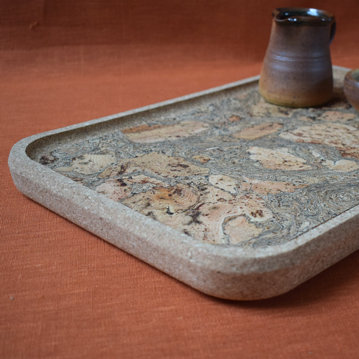 Cork tray with a a rustic cork surface