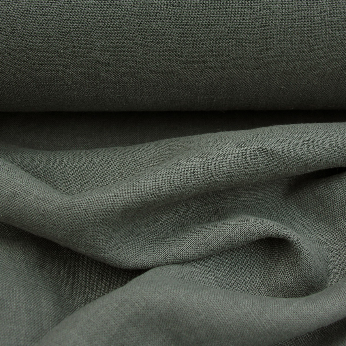 100% Linen fabric with a super soft drape in a soft dark olive green. Suitable for curtains and blinds where a good drape is uppermost.