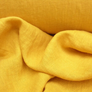 100% Linen fabric with a super soft drape in a sunshine yellow. This mid weight linen is suitable for curtains and blinds where a good drape is uppermost.