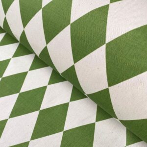 Harlequin design fabric in green diamonds
