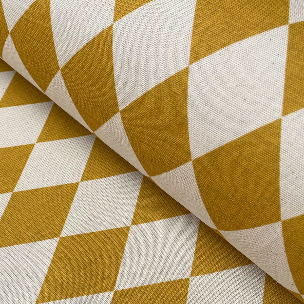 Harlequin design fabric in mustard