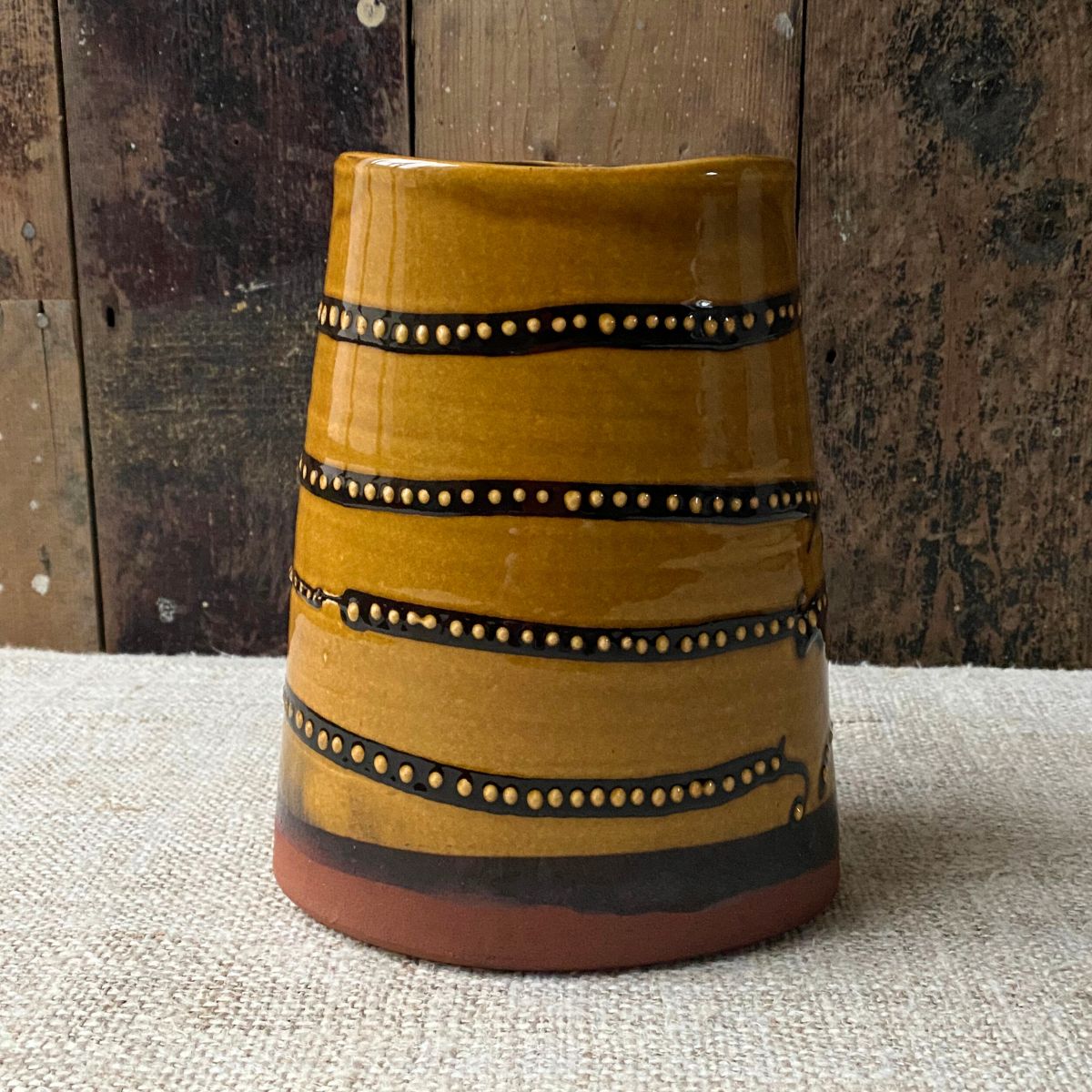 Erica Taylor Low amber glaze slipware vase