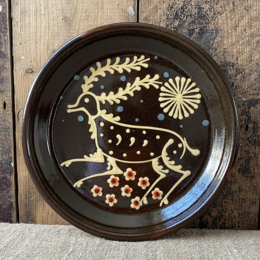 Ceramic slipware plate with a STAG design by Paul Young