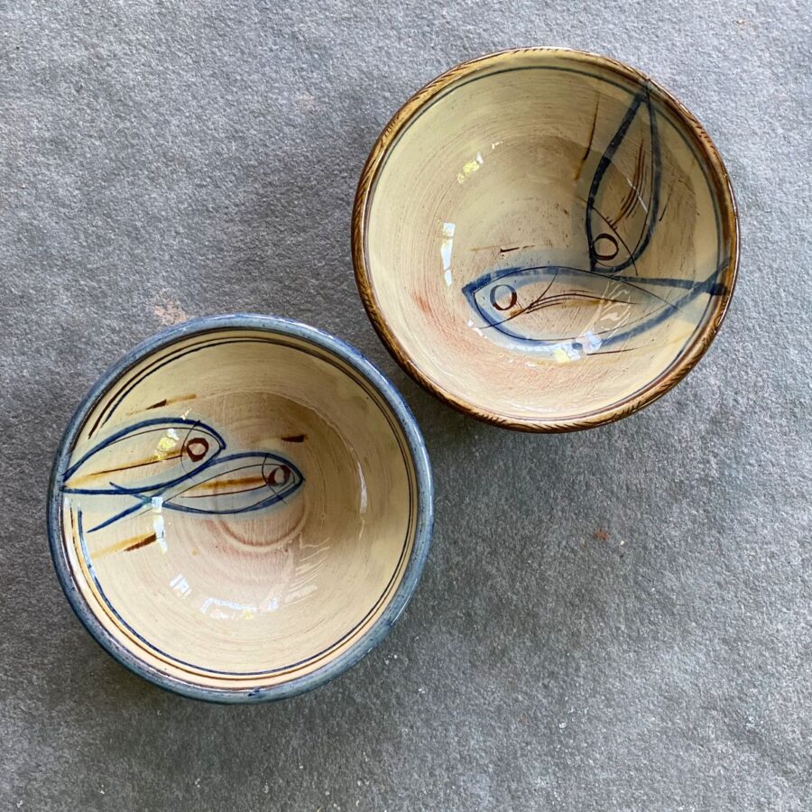 Slipware bowl taken from above on a stone floor