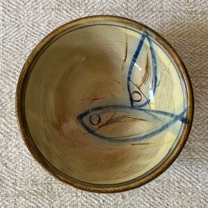 Jennifer Hall Cream Slipware bowl taken from above, on a cream backcloth