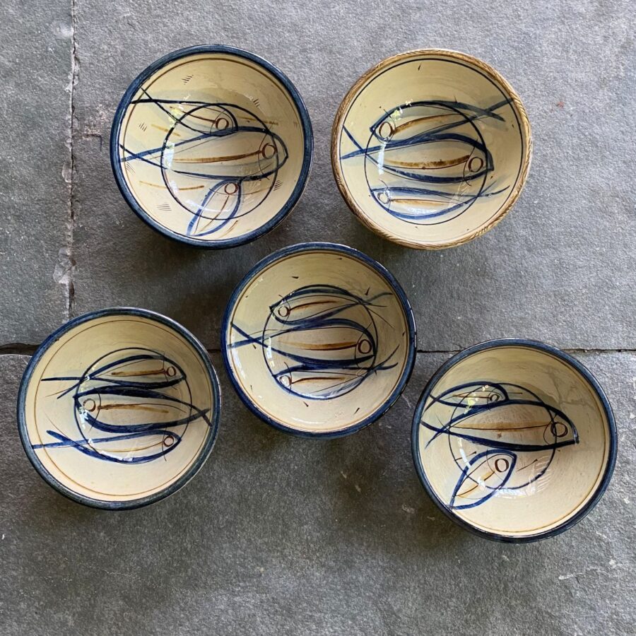 Jennifer Hall slipware breakfast bowls from above on a stone background