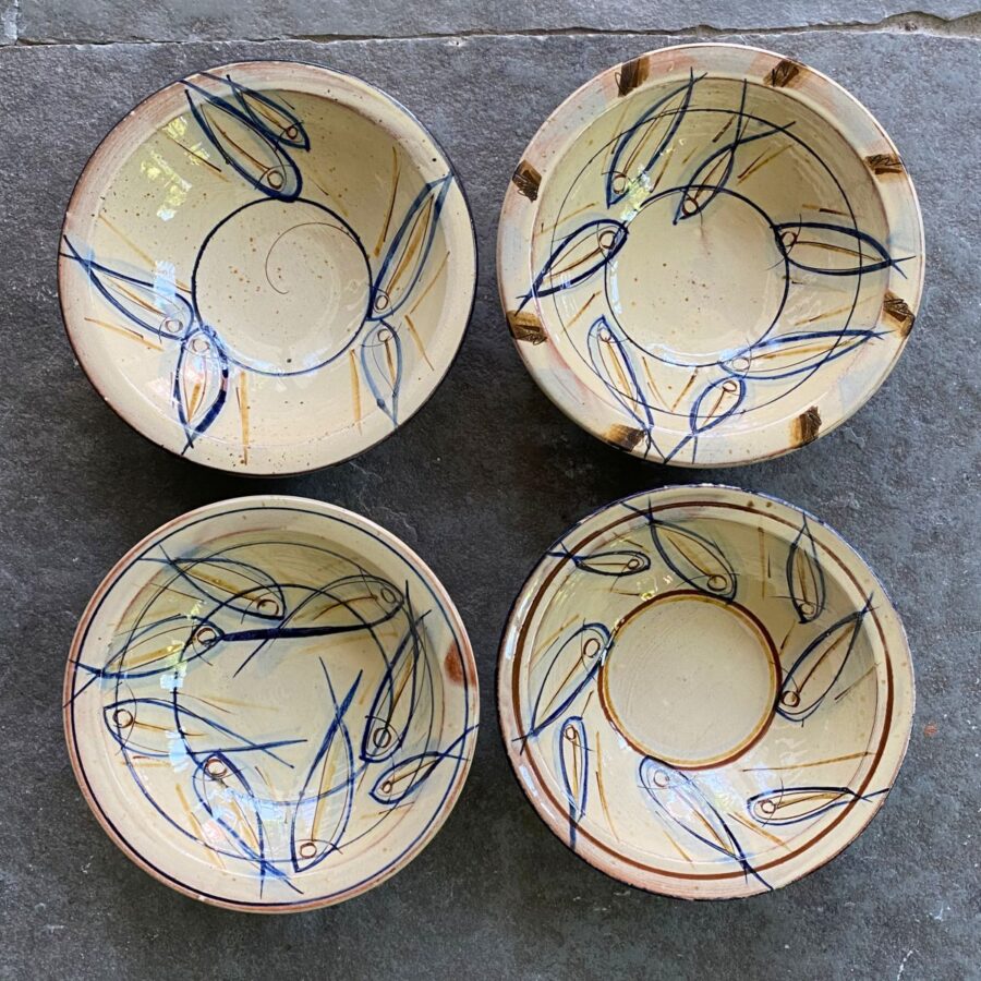 Jennifer Hall slipware breakfast bowls from above on a stone background