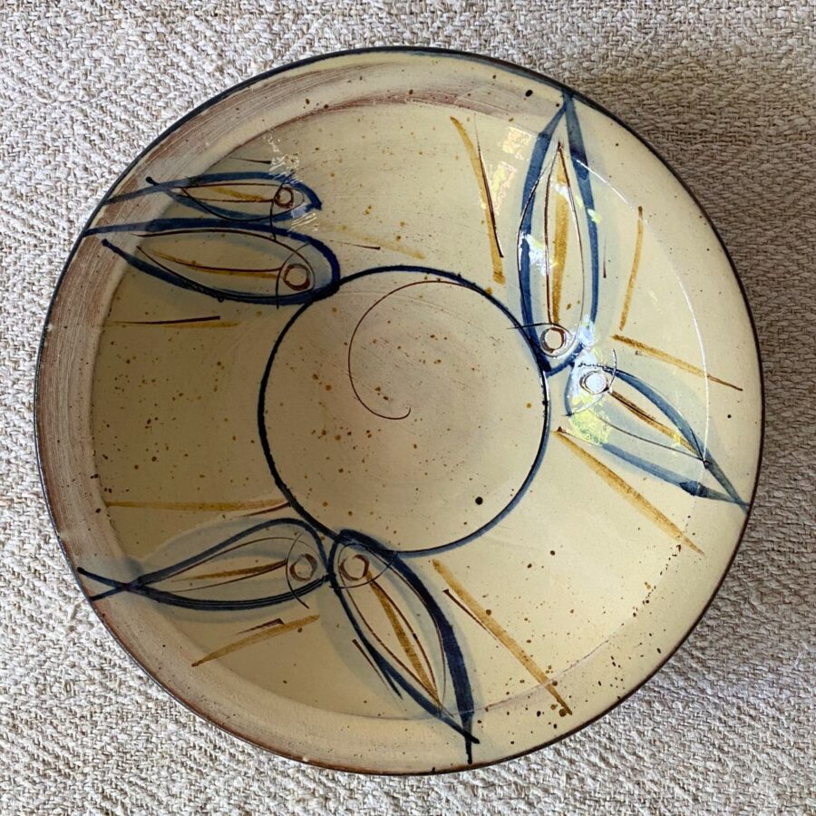 Jennifer Hall slipware breakfast bowls from above on a cream textile background