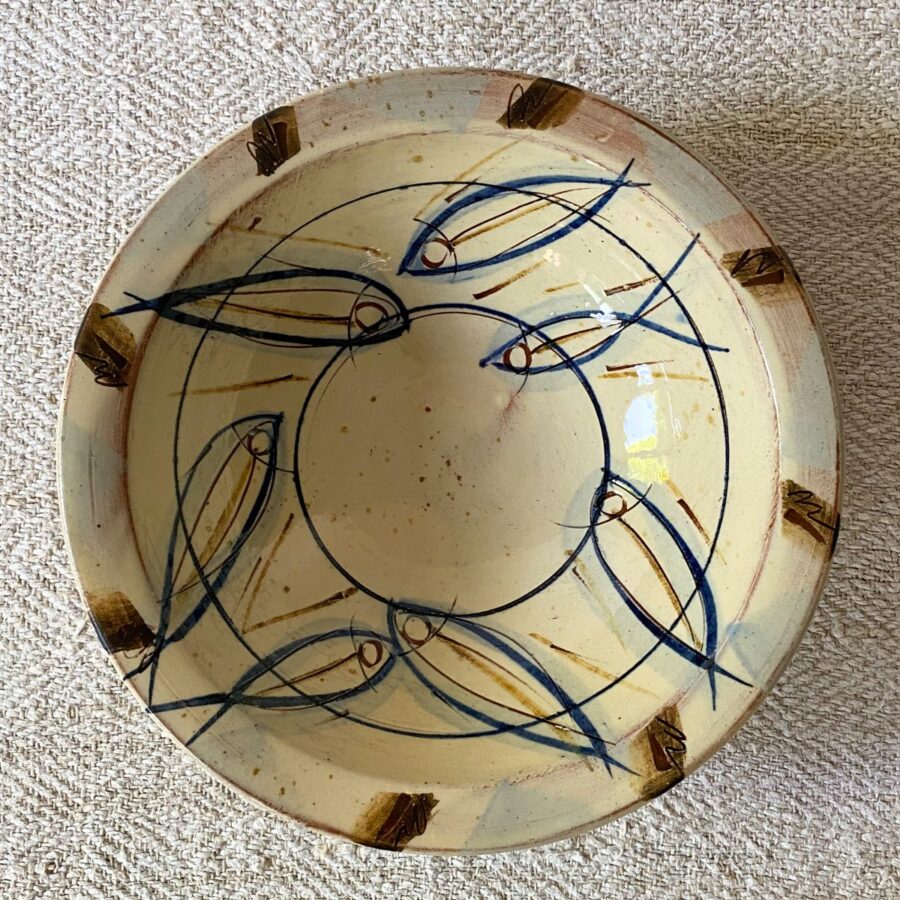 Jennifer Hall slipware breakfast bowls from above on a cream textile background