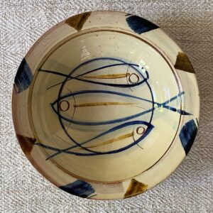 Jennifer Hall Slipware pasta bowl from above on a cream textile background
