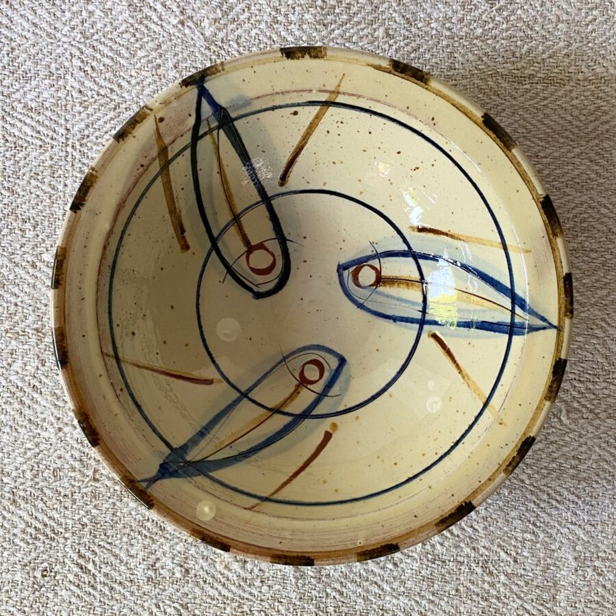 Jennifer Hall Slipware pasta bowl from above on a cream textile background