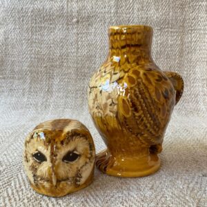 Pottery jug in shape of an ow, with a removable head
