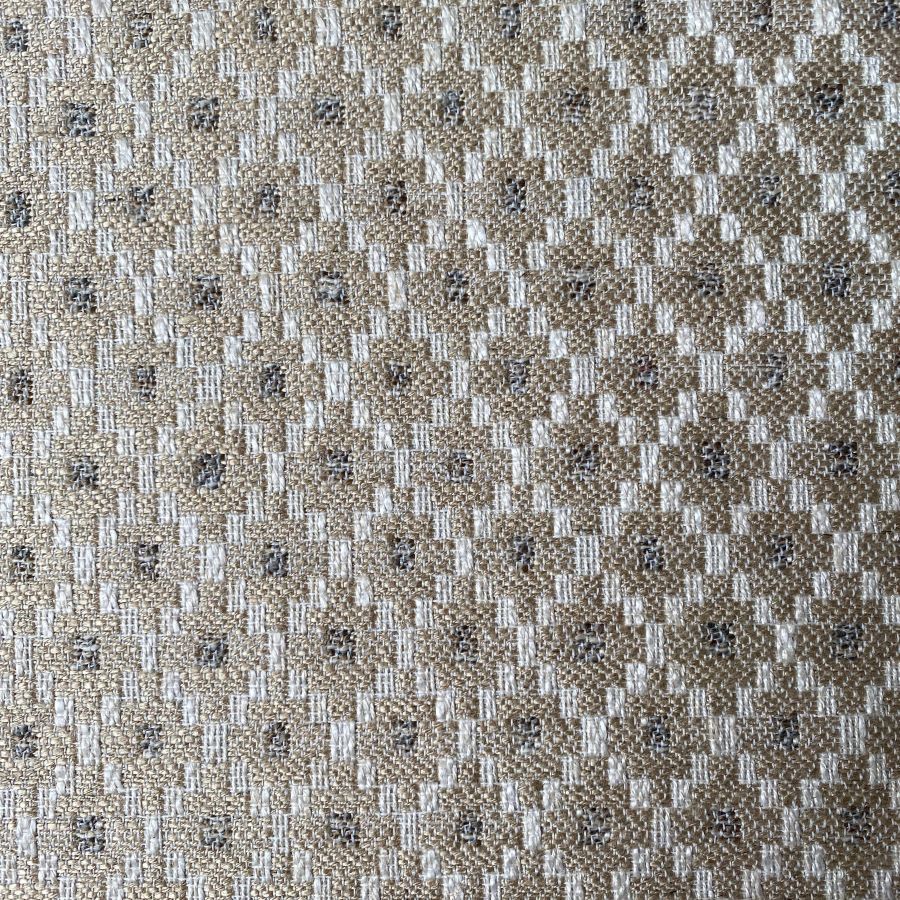 Cream, diamond patterned upholstery fabric