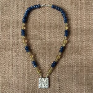 Silver Hawk necklace with blue and amber beads