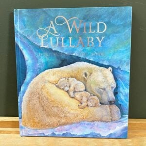 Front cover of a book called The Wild Lullaby with a watercolour image of a mother & cub polarbear asleep